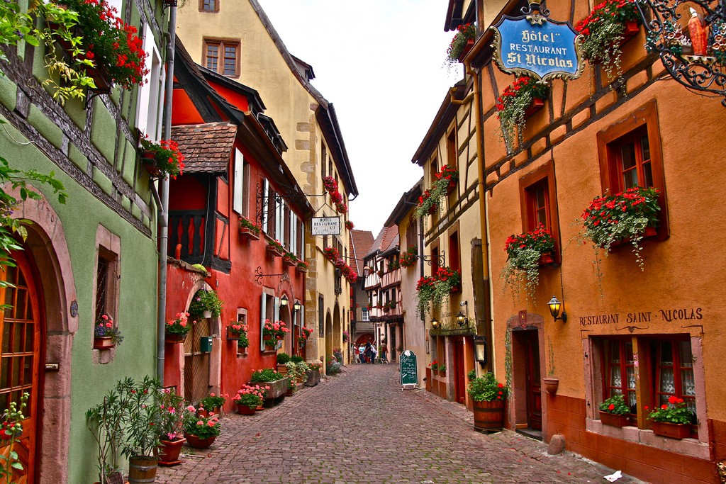 Here's a place you haven't heard of yet - Eguisheim is a commune in Alsace, France renowned for its high quality wines. Other than great wines? Great colored old houses and streets!