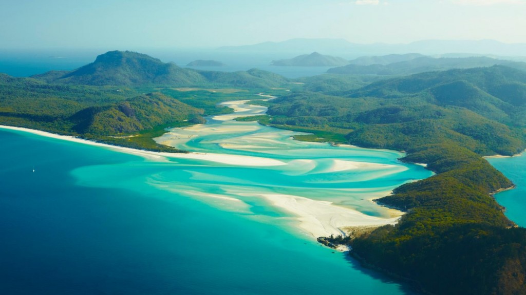 Among many other attactions, Australia's aquatic experiences are pure bliss. Pictured above: Whitehaven Beach and Hamilton Island, Queensland